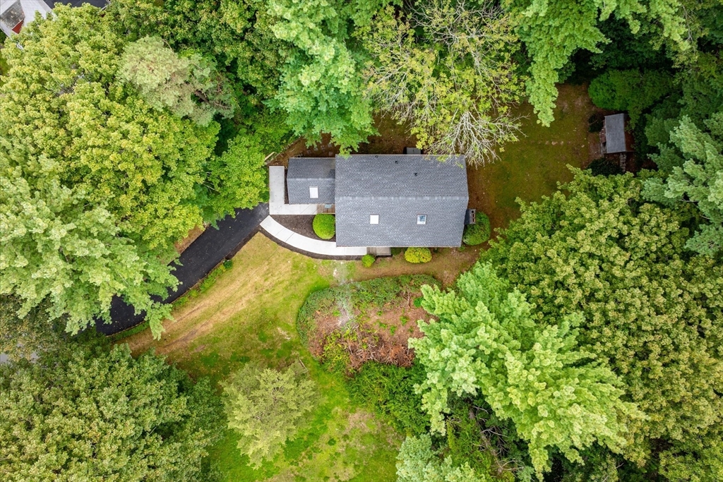 34 Carleton Road Hingham, MA 02043 - Photo 33 of 35 a view of a house with a yard