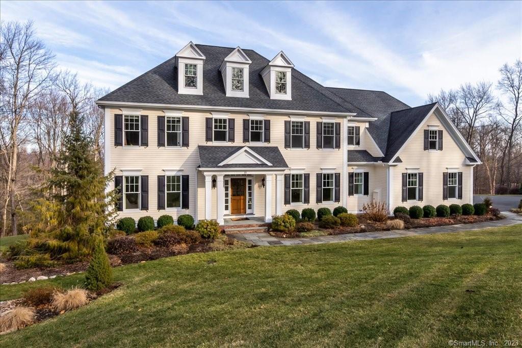 35 Sweetheart Mountain Road Canton, CT 06019 - Photo 1 of 1 a front view of a house with a yard