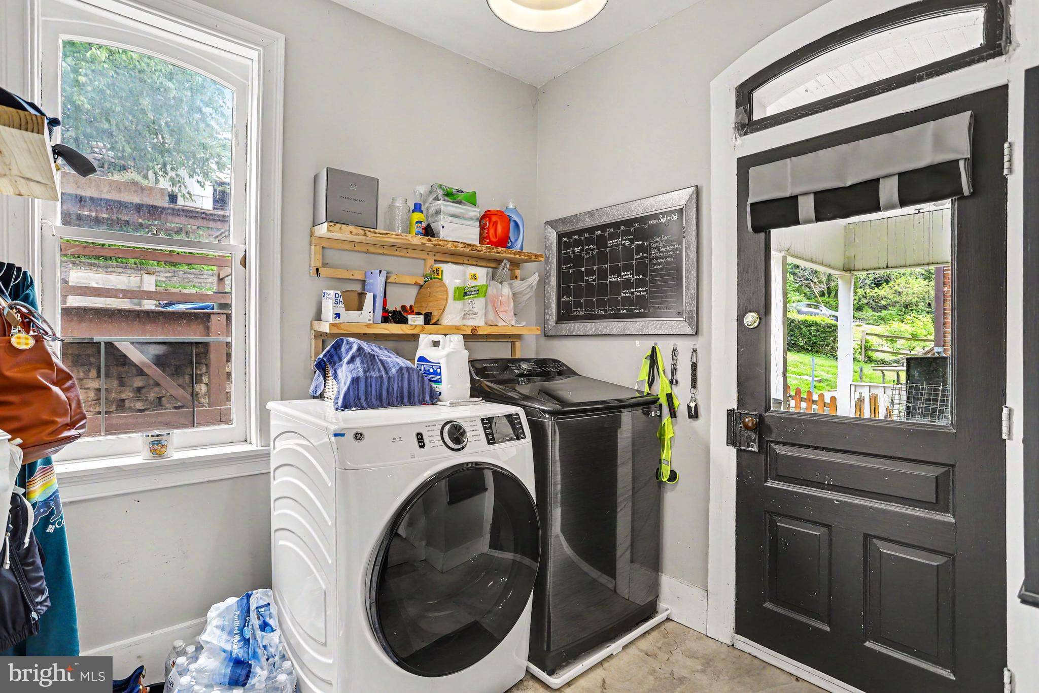 23 West George Street Yoe, PA 17313 - Photo 22 of 36 a utility room with dryer and washer