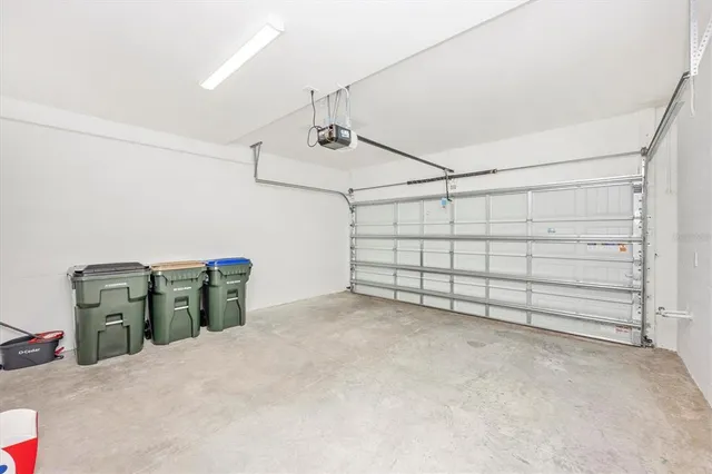 a view of a house with backyard porch and sitting area