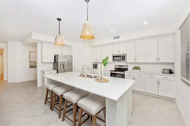 a view of a dining room with furniture