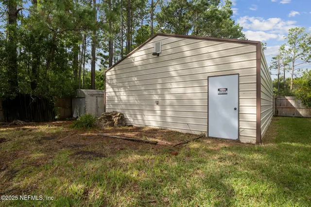 a view of backyard of house