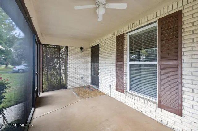 a view of a livingroom with a balcony
