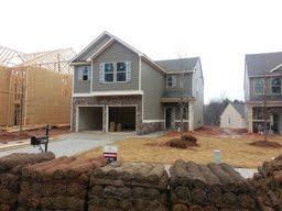 5075 Jack Drive, Unit 77 Decatur, GA 30035 - Photo 1 of 1 a front view of a house with a yard