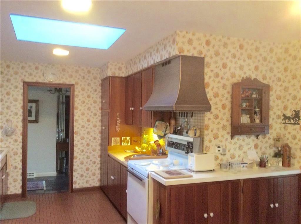 119 Forrest Road New Castle, PA 16105 - Photo 6 of 20 Cherry Cabinets in Spacious Eat in Kitchen