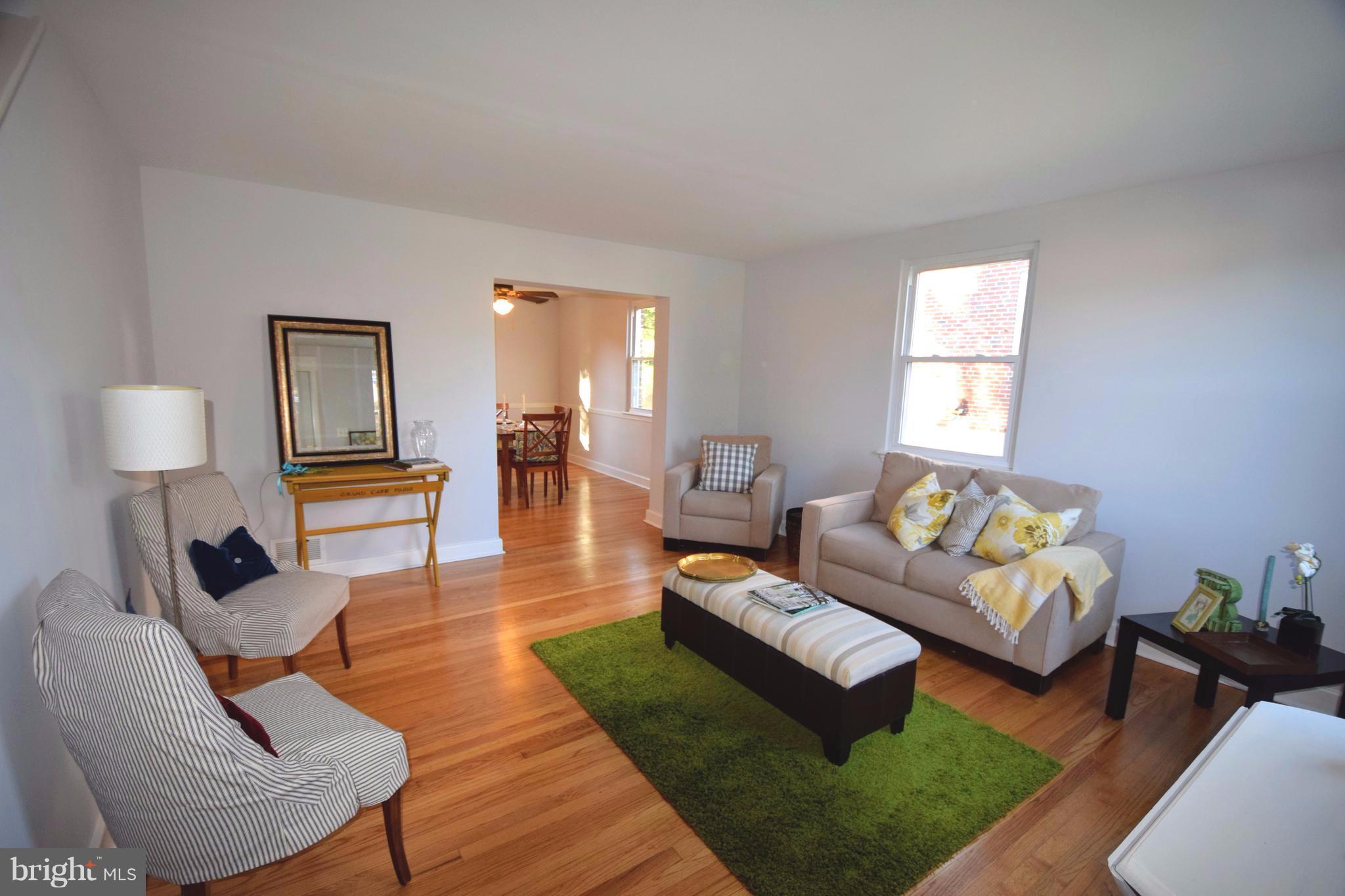 8536 Water Oak Road Baltimore, MD 21234 - Photo 3 of 27 a living room with furniture and a wooden floor