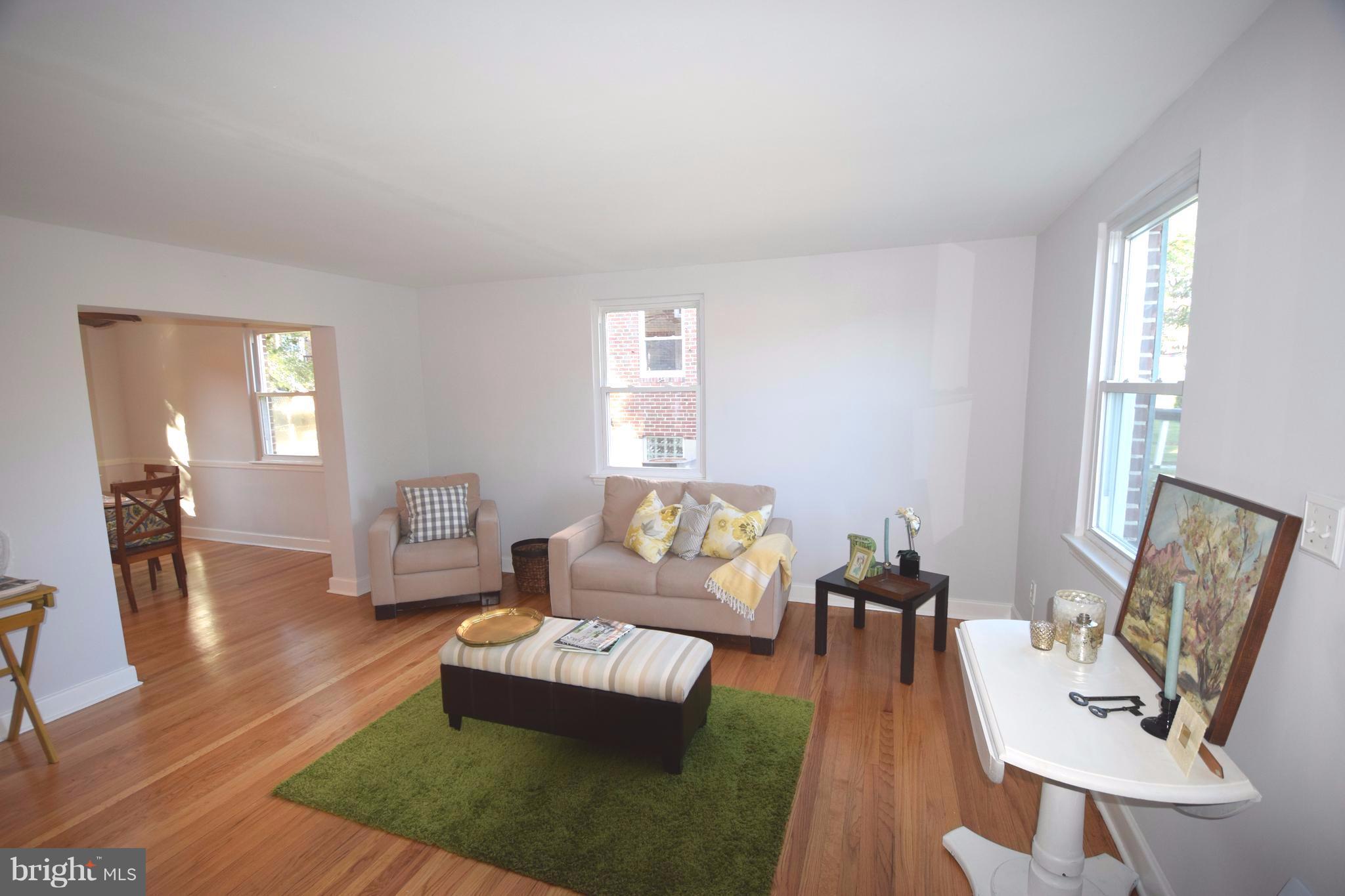 8536 Water Oak Road Baltimore, MD 21234 - Photo 5 of 27 a living room with furniture and a wooden floor