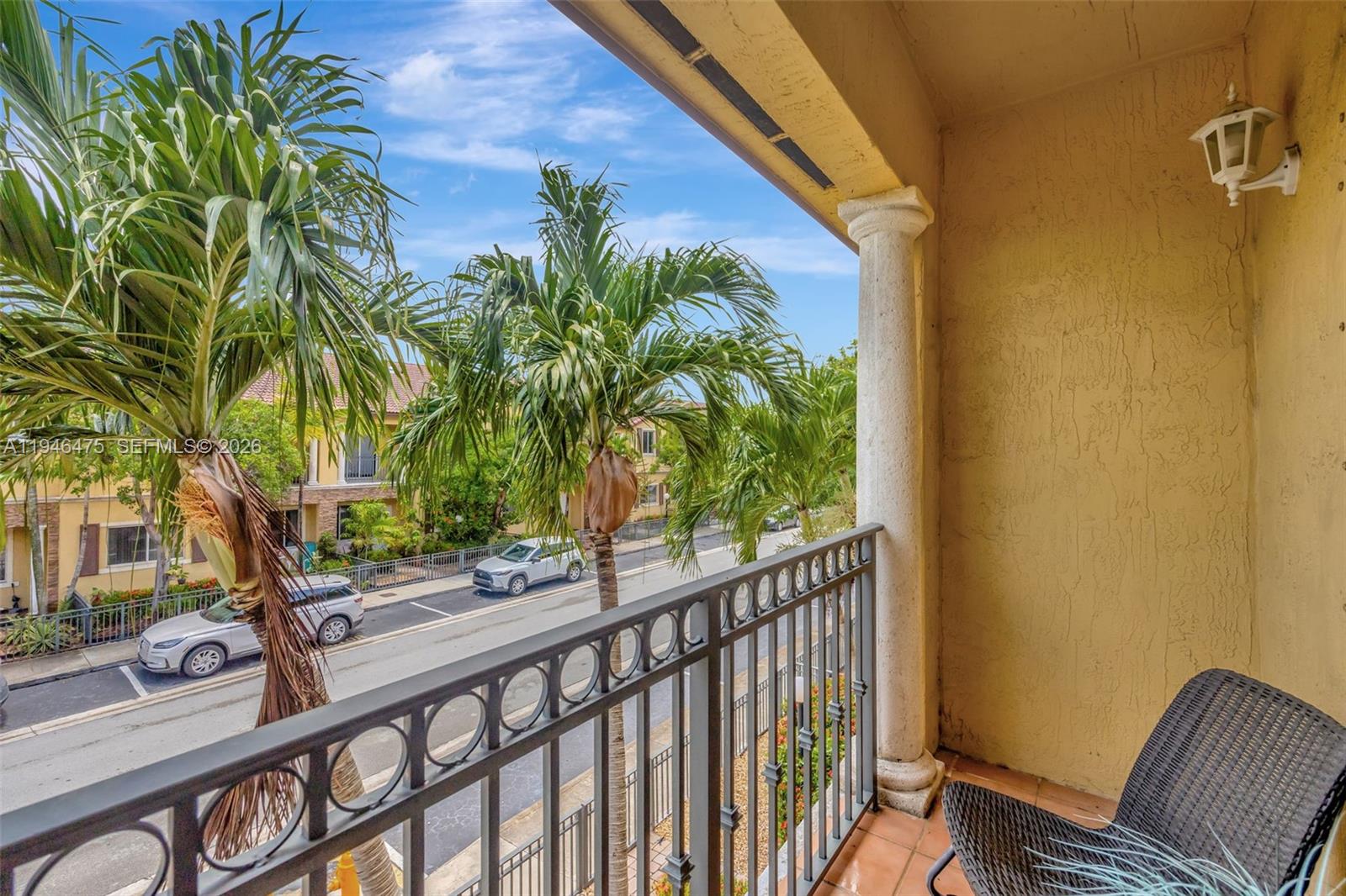 11227 Southwest 230th Terrace, Unit 11227 Miami, FL 33170 - Photo 34 of 37 a view of a balcony with potted plants