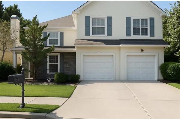 a house view with garden space