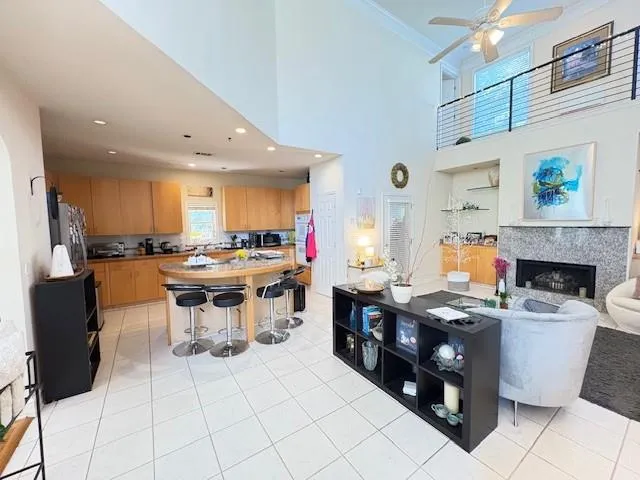 a kitchen with a sink and a refrigerator