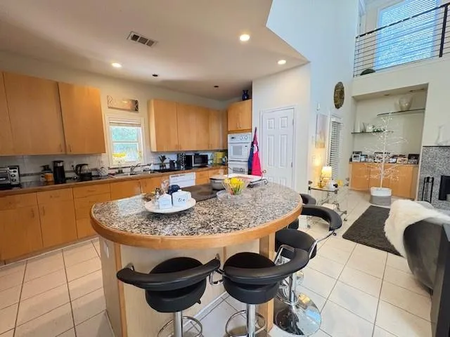 a very nice looking dining room with a table and chairs