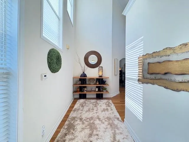 a view of a hallway with washer and dryer