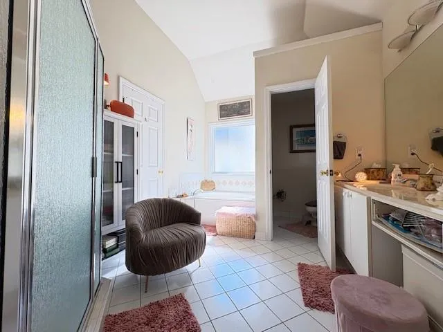 a living room with furniture and a rug