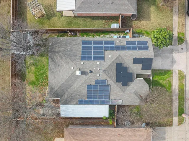 a view of a swimming pool and an outdoor space