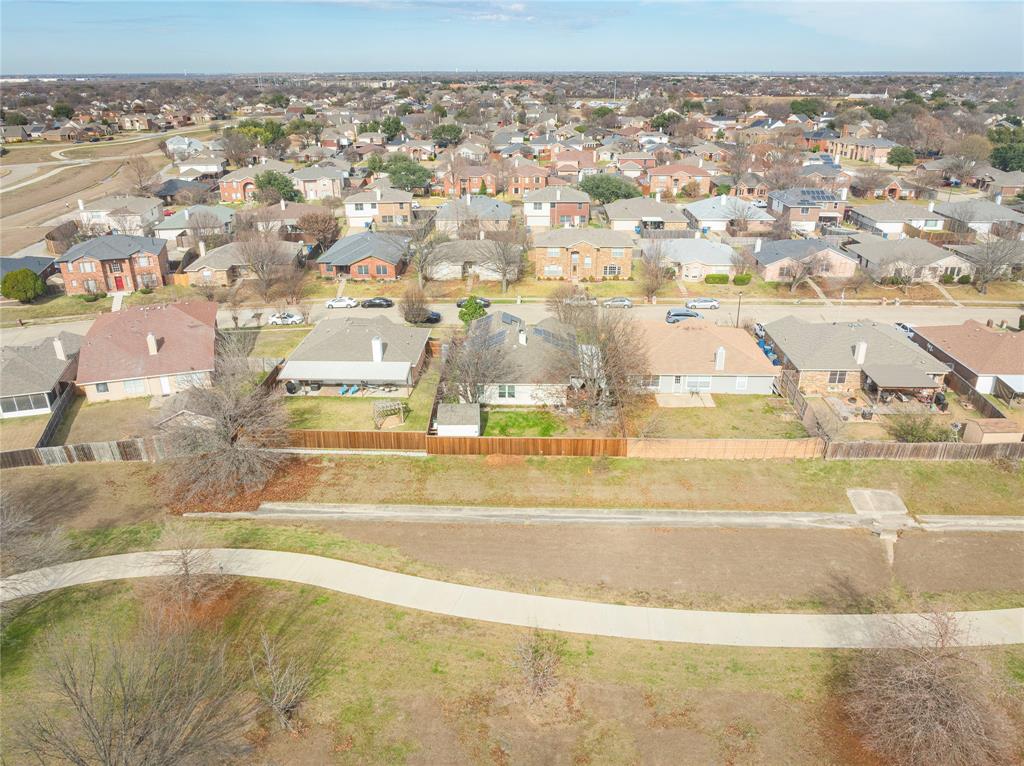 7613 Dockside Drive Rowlett, TX 75088 - Photo 27 of 40 a view of a swimming pool and an outdoor space