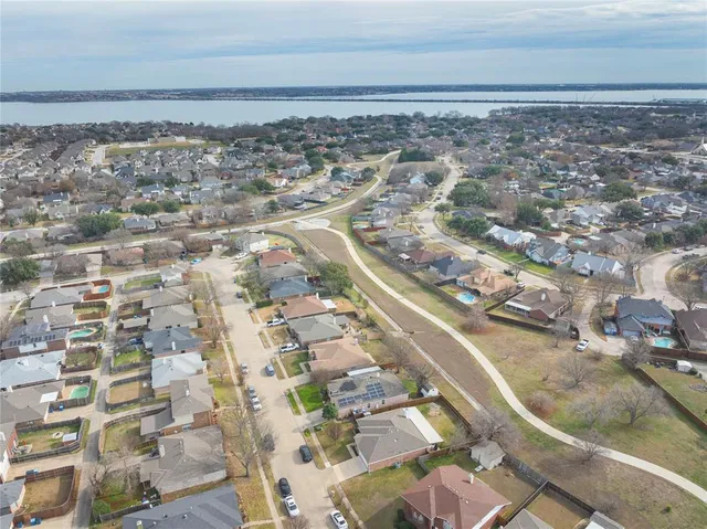 a view of a lake with a city