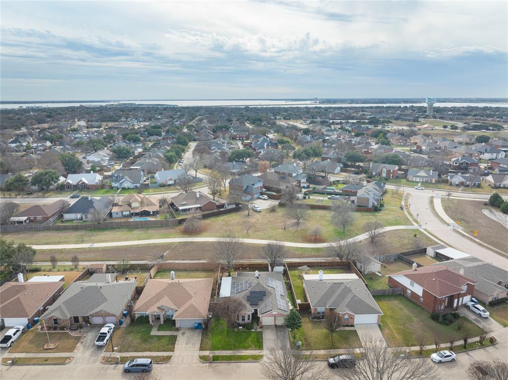 7613 Dockside Drive Rowlett, TX 75088 - Photo 32 of 40 a view of a lake with a city