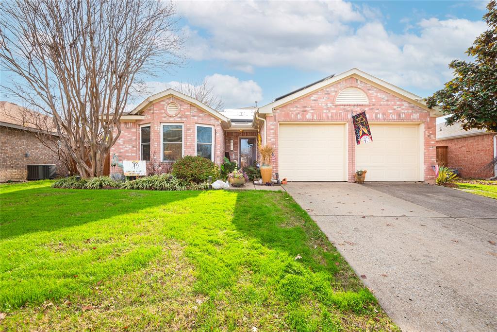 7613 Dockside Drive Rowlett, TX 75088 - Photo 35 of 40 a front view of a house with garden