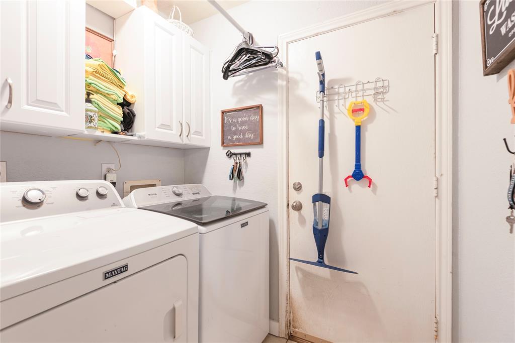 7613 Dockside Drive Rowlett, TX 75088 - Photo 38 of 40 a utility room with dryer and washer