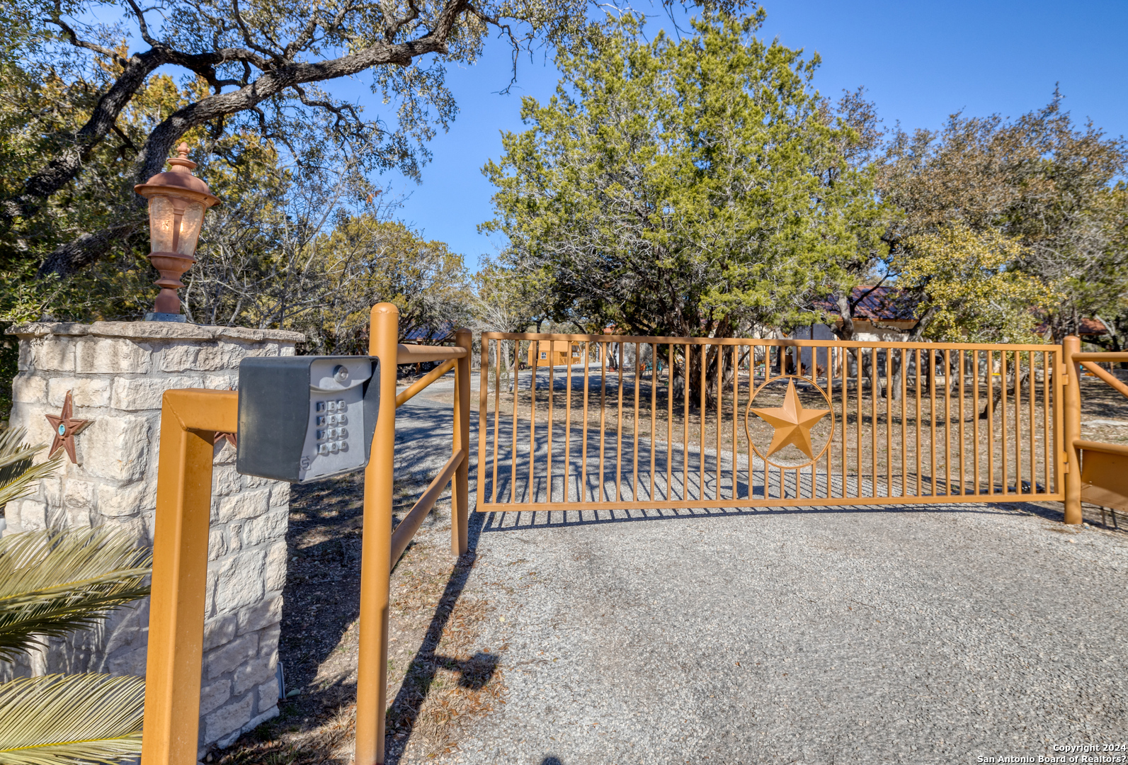 93 North Saddle Mountain Road Rio Frio, TX 78879 - Photo 11 of 50 a view of a house with a wooden deck