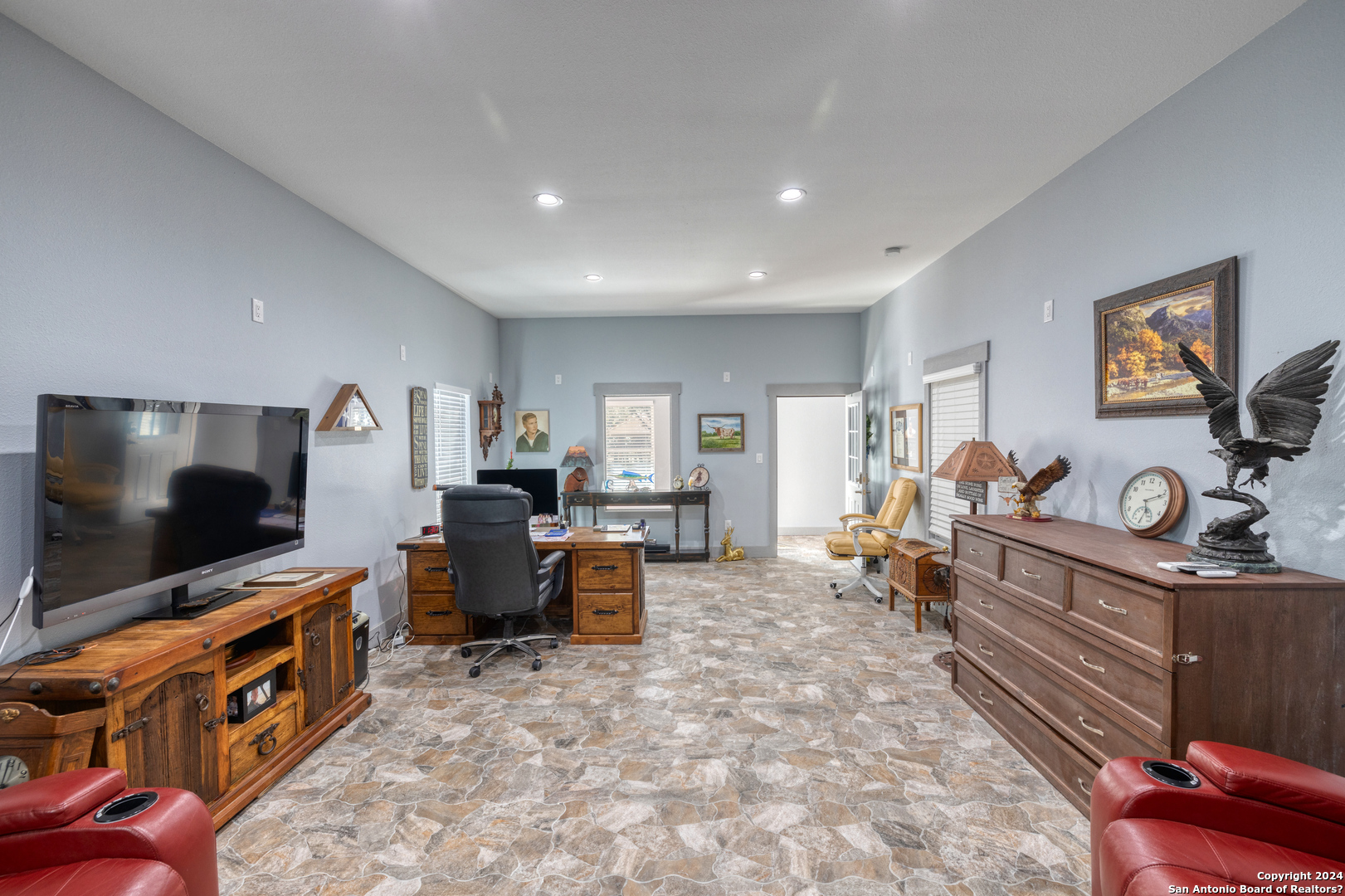 93 North Saddle Mountain Road Rio Frio, TX 78879 - Photo 17 of 50 a living room with furniture and a flat screen tv