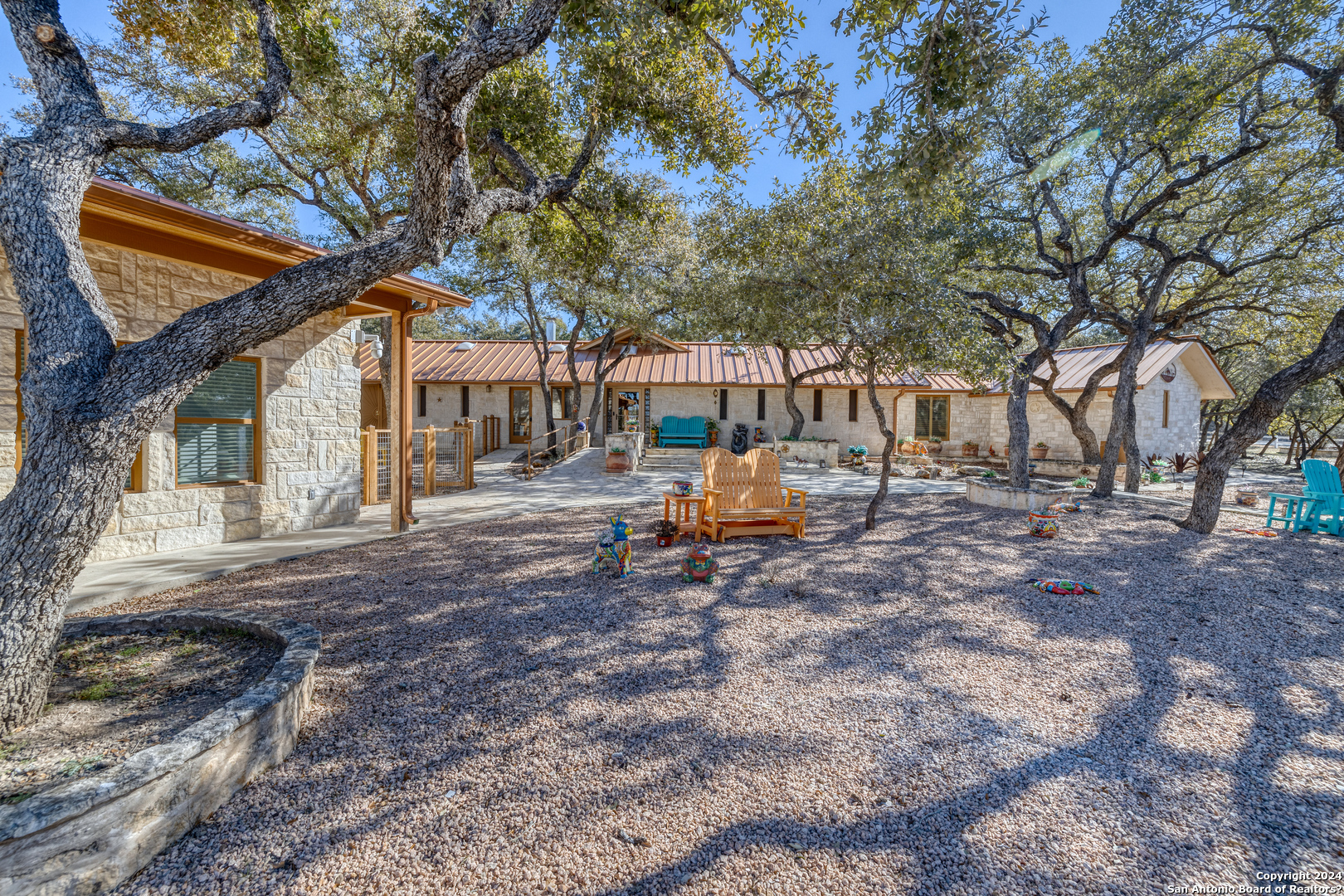 93 North Saddle Mountain Road Rio Frio, TX 78879 - Photo 3 of 50 a view of house with backyard and tree