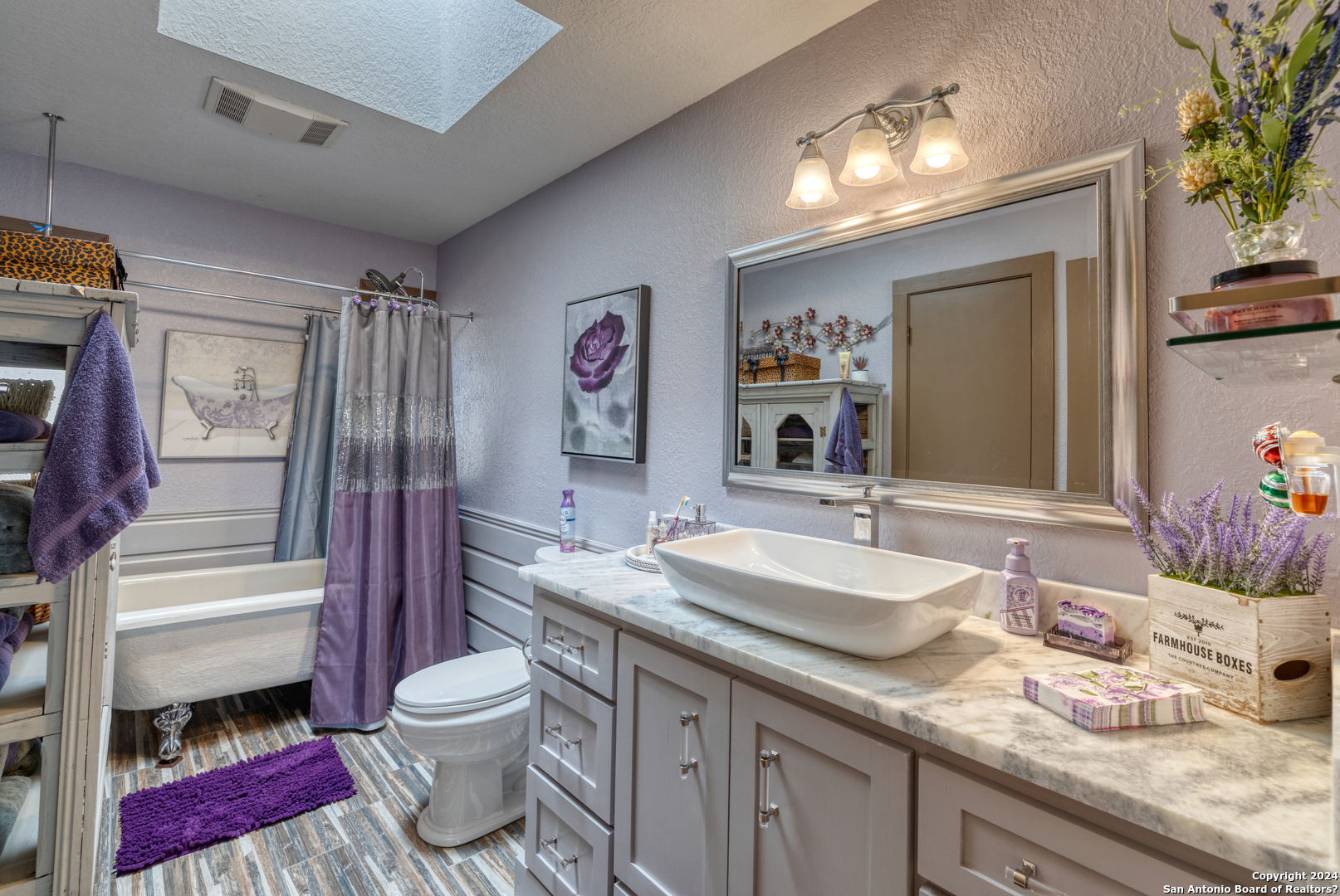 93 North Saddle Mountain Road Rio Frio, TX 78879 - Photo 35 of 50 a bathroom with a granite countertop toilet sink and mirror