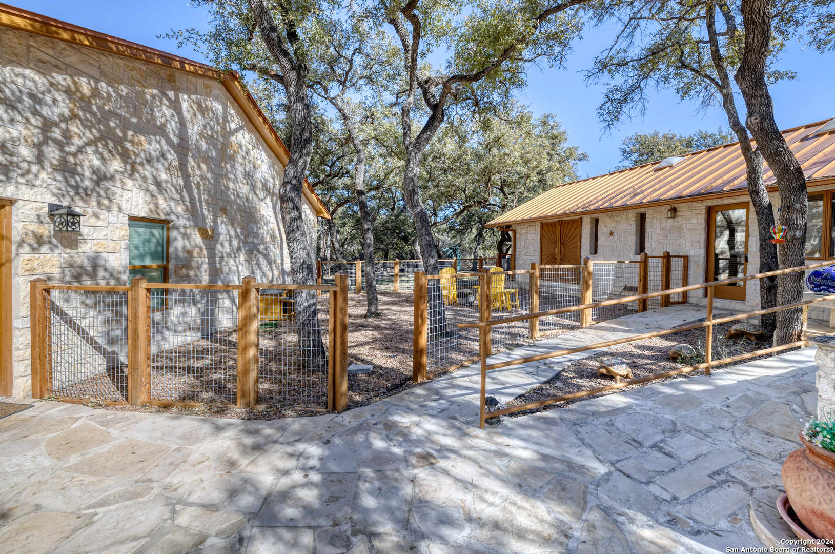 93 North Saddle Mountain Road Rio Frio, TX 78879 - Photo 4 of 50 a view of a blue house with outdoor space