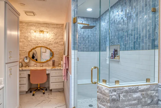 a living room with lots of furniture and a chandelier