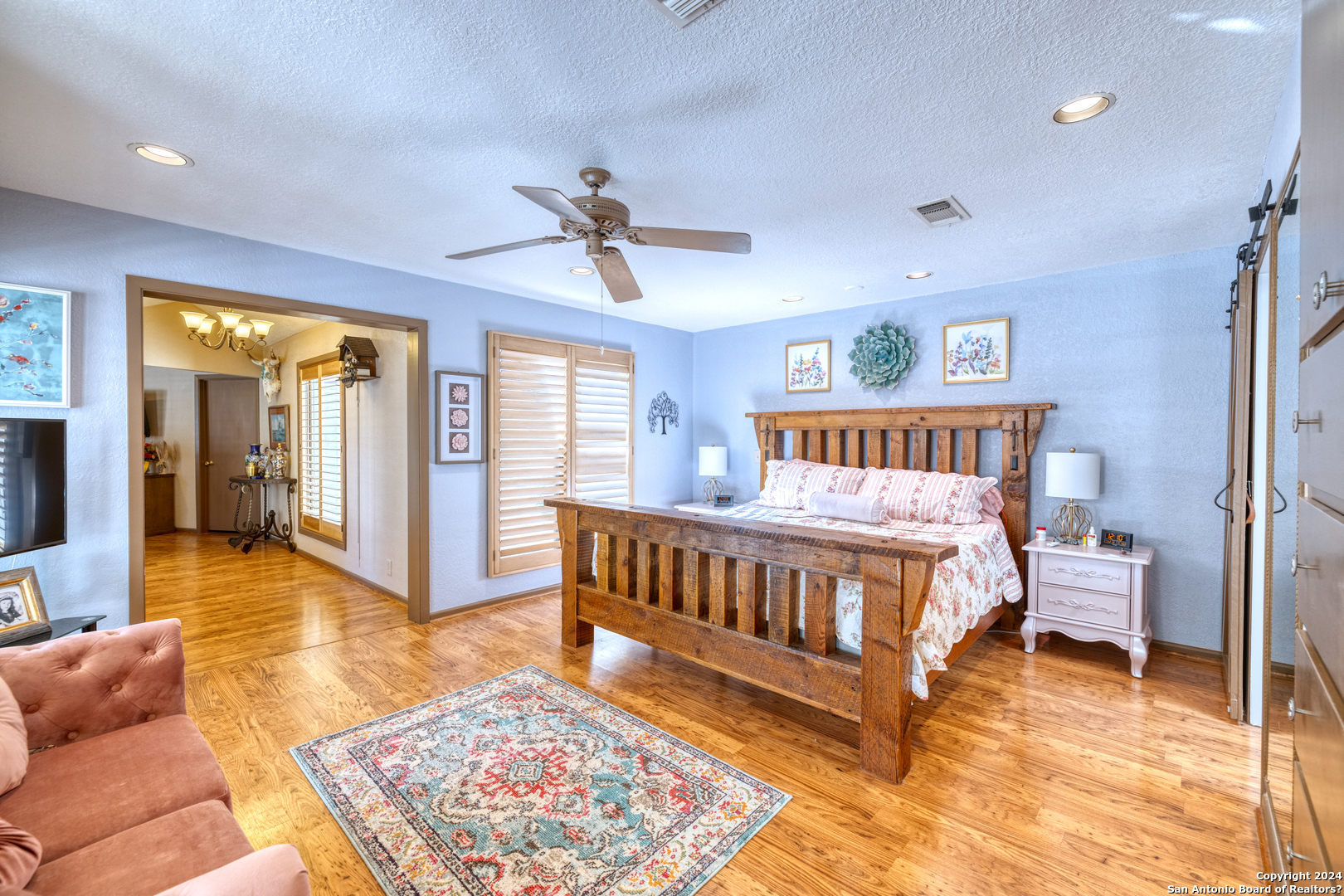 93 North Saddle Mountain Road Rio Frio, TX 78879 - Photo 42 of 50 a spacious bedroom with a bed and a rug