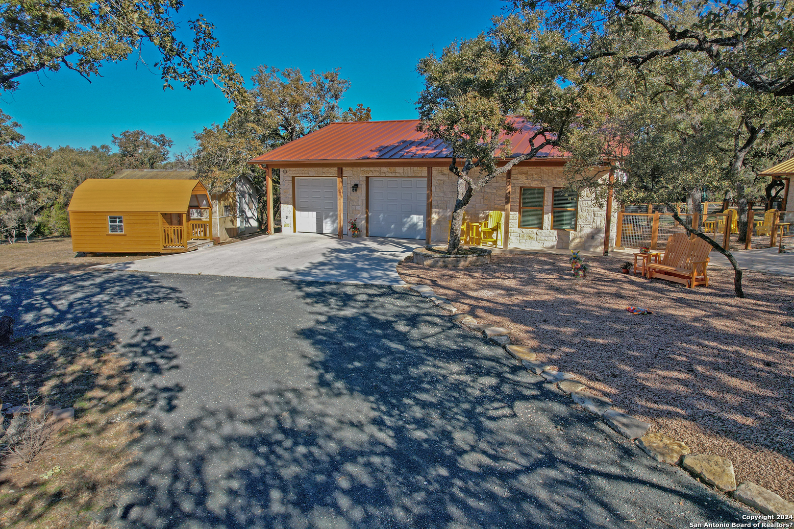 93 North Saddle Mountain Road Rio Frio, TX 78879 - Photo 6 of 50 a front view of a house with a yard