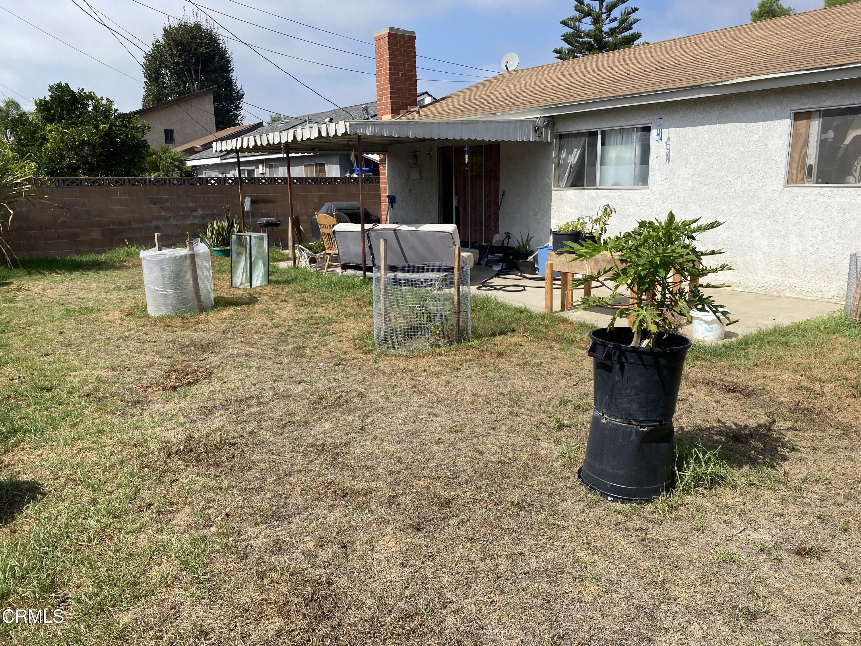 1200 Bluebell Street Oxnard, CA 93036 - Photo 5 of 6 a view of a house with backyard and sitting area
