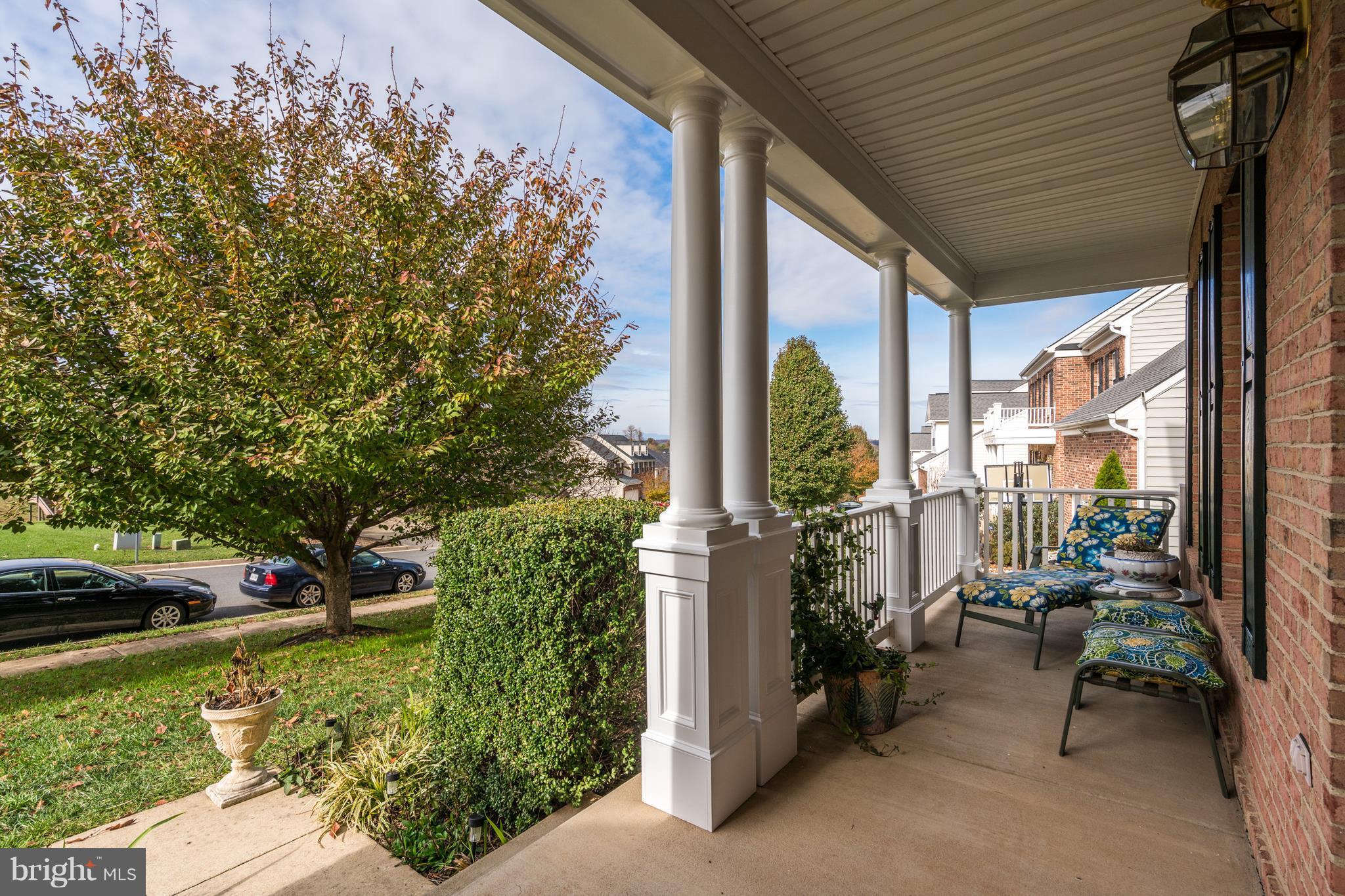 842 Kingsbrook Road Culpeper, VA 22701 - Photo 2 of 30 a view of a porch with couches next to a yard