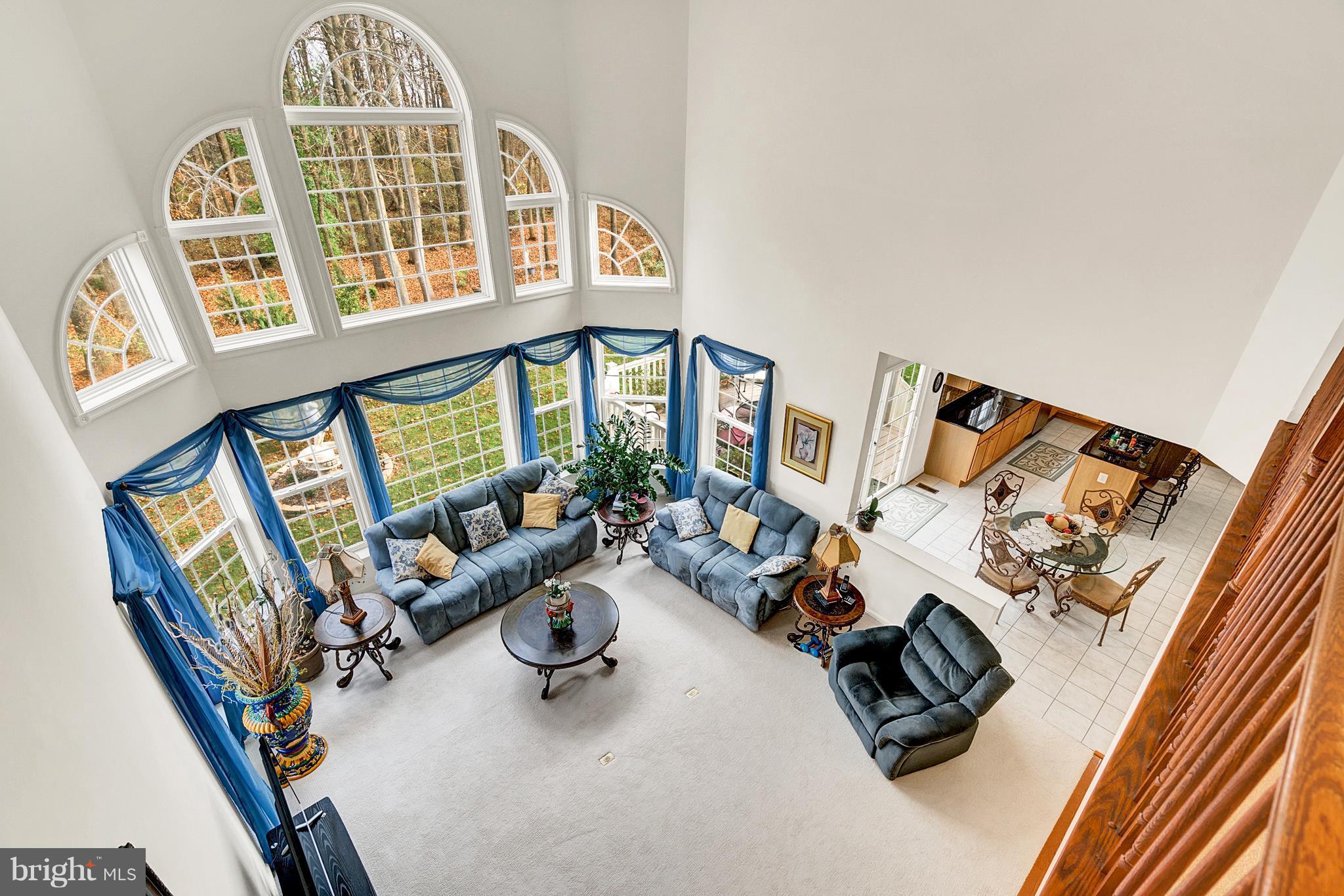 842 Kingsbrook Road Culpeper, VA 22701 - Photo 13 of 30 a view of a livingroom with furniture hardwood floor and windows