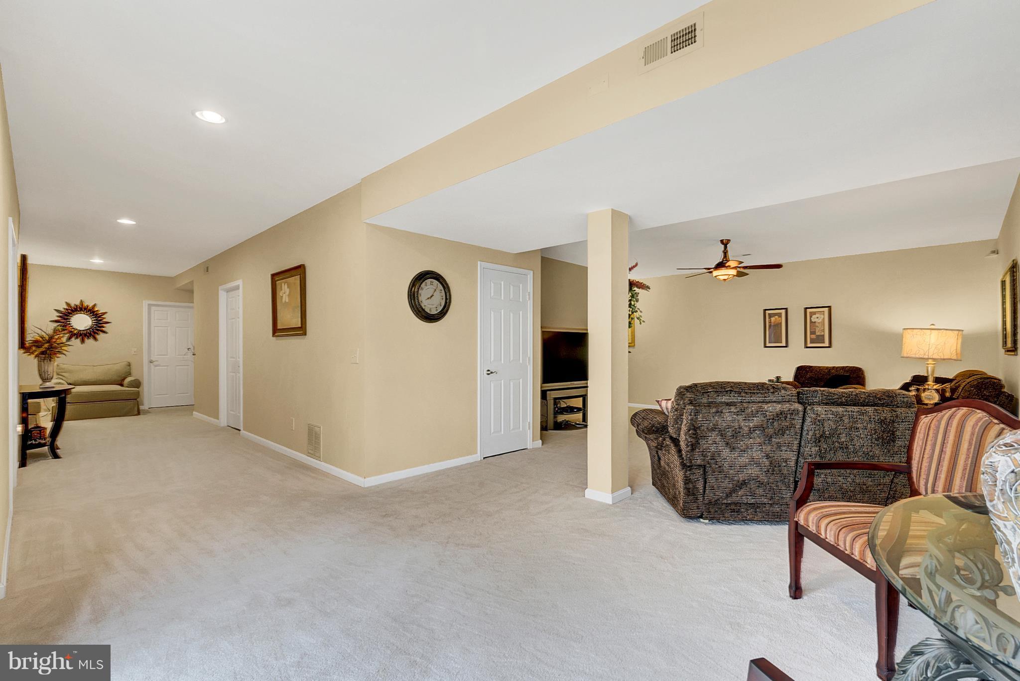 842 Kingsbrook Road Culpeper, VA 22701 - Photo 29 of 30 a living room with furniture and a table