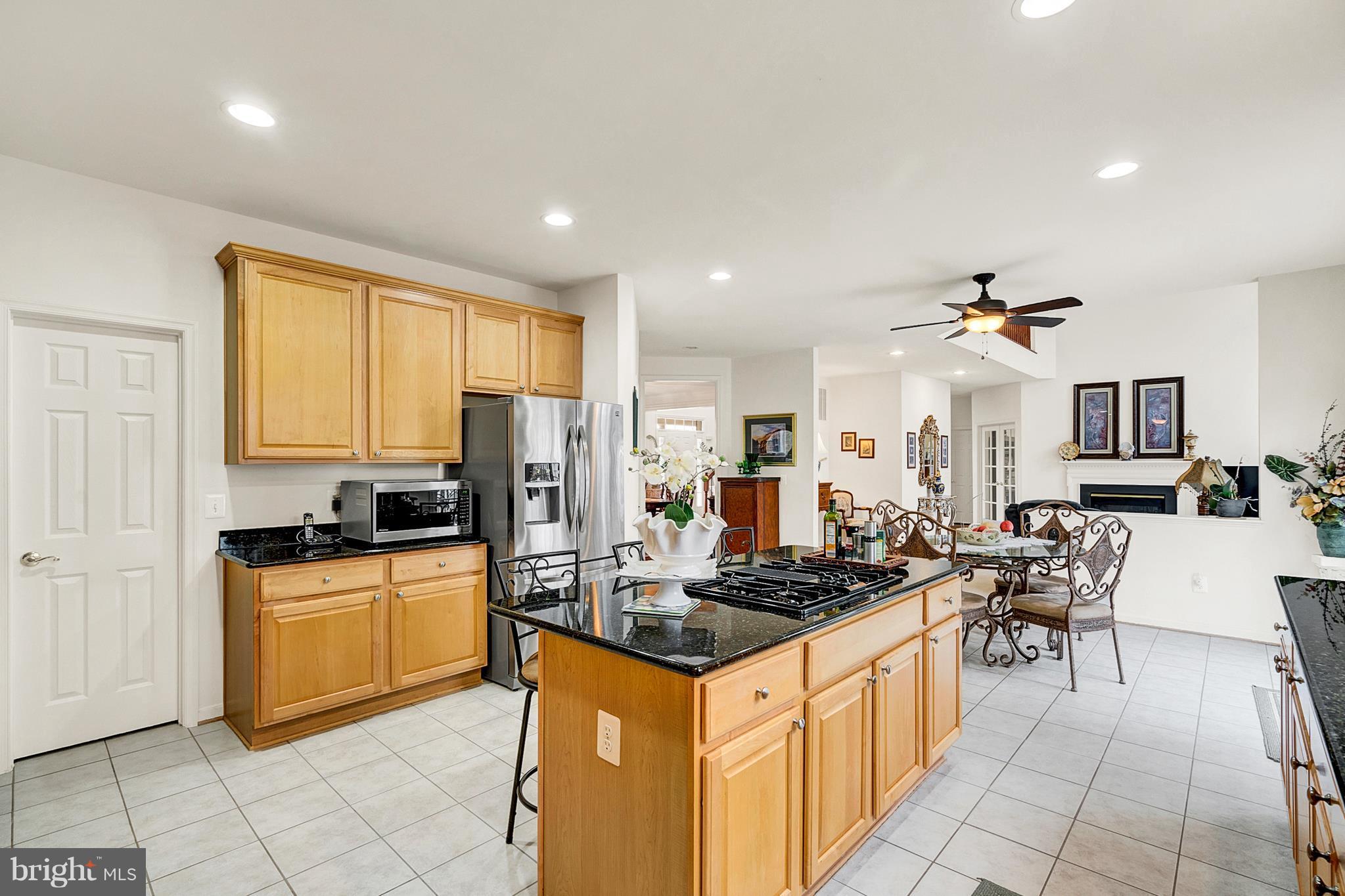 842 Kingsbrook Road Culpeper, VA 22701 - Photo 10 of 30 a kitchen with granite countertop a sink cabinets and stainless steel appliances