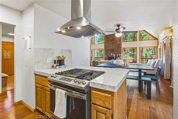 a view of a kitchen with a tub and windows