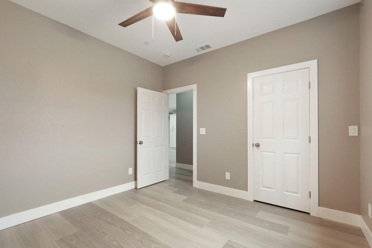 9421 Carter Court Stockton, CA 95209 - Photo 12 of 31 an empty room with closet area