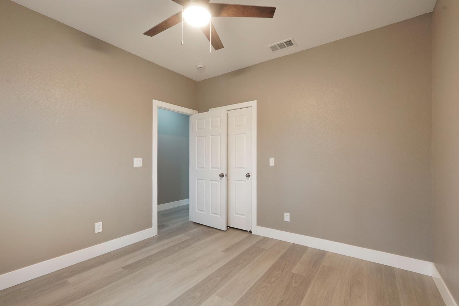 9421 Carter Court Stockton, CA 95209 - Photo 17 of 31 an empty room with closet area