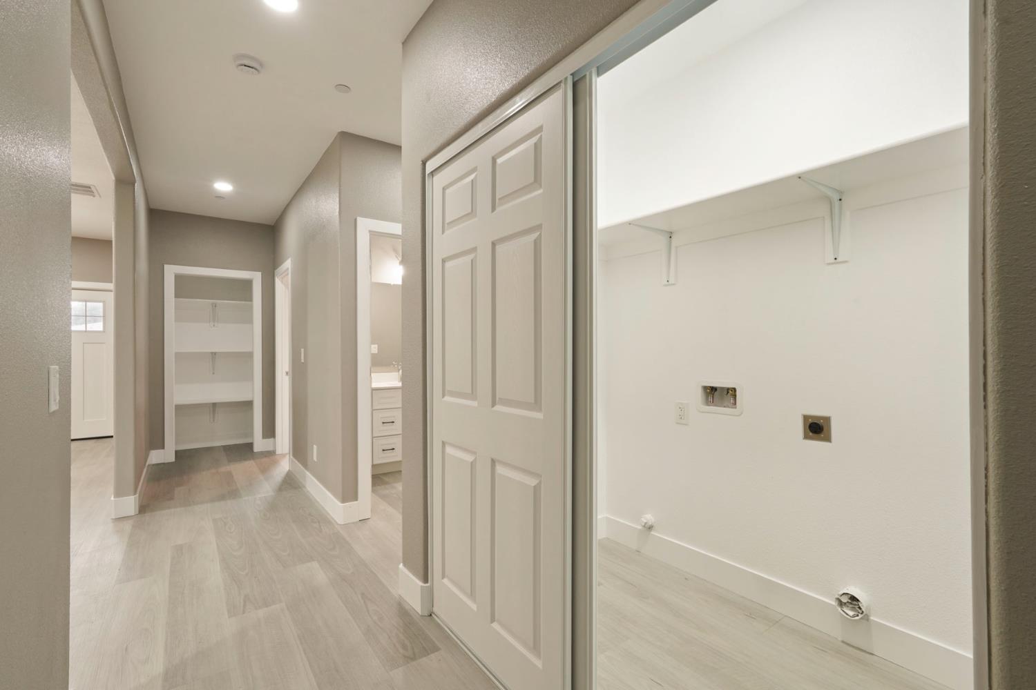 9421 Carter Court Stockton, CA 95209 - Photo 18 of 31 a bathroom with a glass shower door