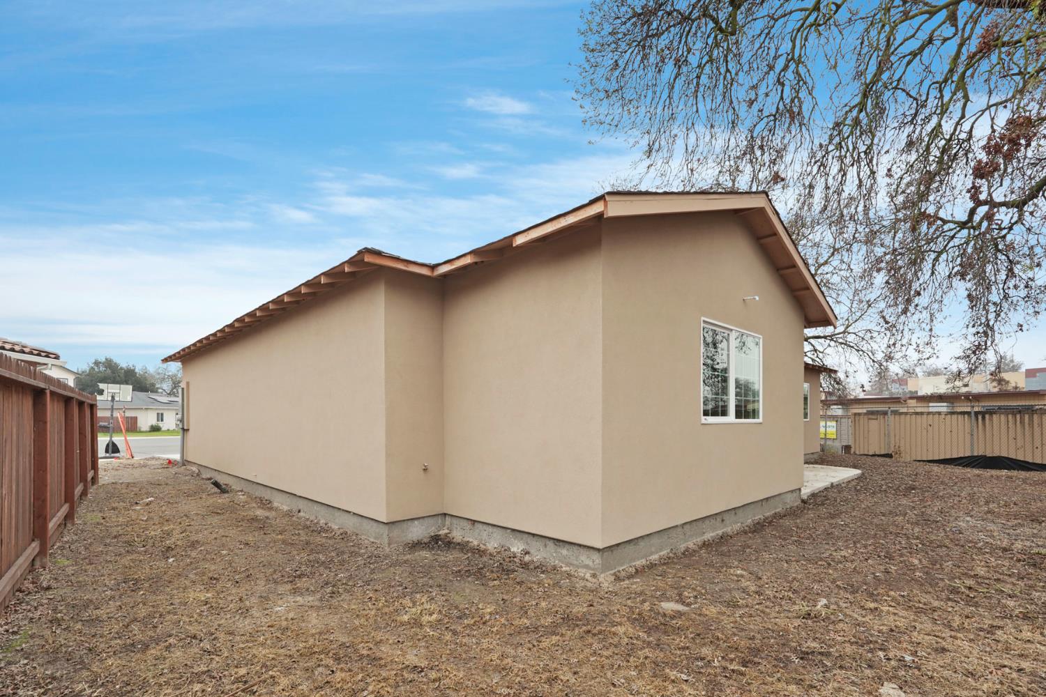 9421 Carter Court Stockton, CA 95209 - Photo 27 of 31 a view of a house with a yard