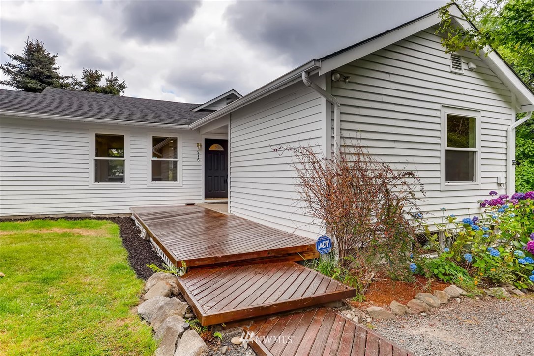 216 174th Street Southwest Bothell, WA 98012 - Photo 5 of 27 a view of a backyard with sitting area