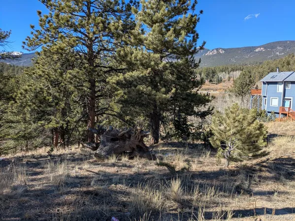 a view of a lake with a building in the background