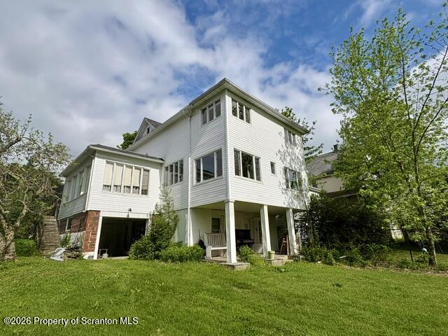 706 Delaware Street Forest City, PA 18421 - Photo 3 of 33 a front view of a house with a yard