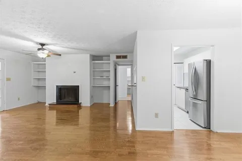 a view of a livingroom with a fireplace