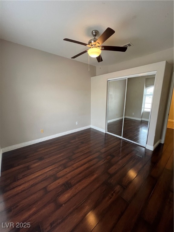 2975 Bluegrass Lane, Unit 424 Henderson, NV 89074 - Photo 23 of 43 2nd bedroom with fan, light and mirrored closet doors