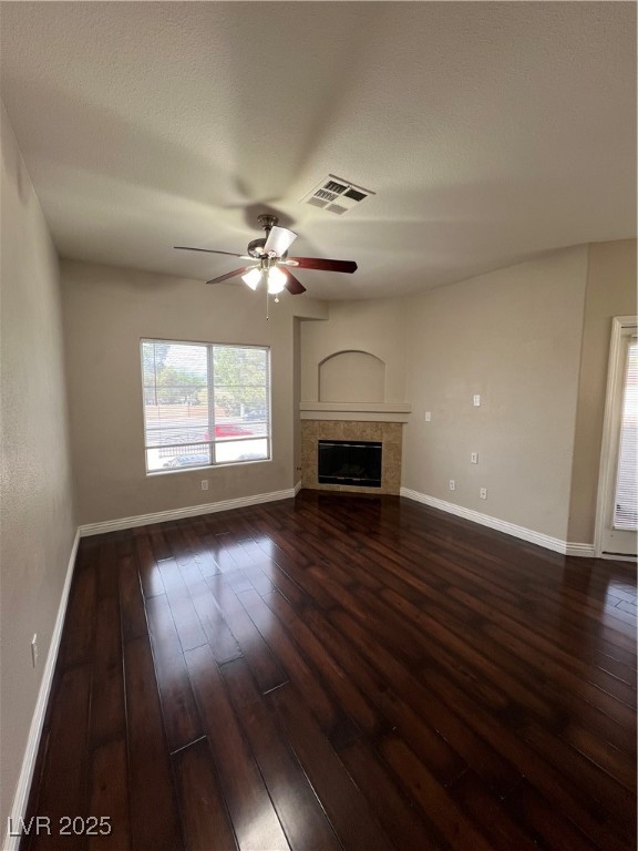 2975 Bluegrass Lane, Unit 424 Henderson, NV 89074 - Photo 3 of 43 Living room with lots of light, miniblinds, fireplace, engineered wood floors and ceiling fan.