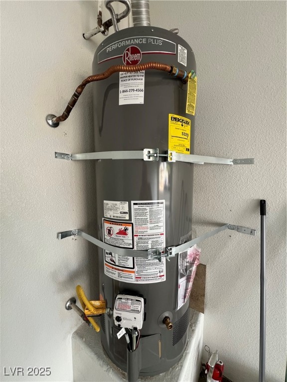 2975 Bluegrass Lane, Unit 424 Henderson, NV 89074 - Photo 35 of 43 Hot water heater in garage