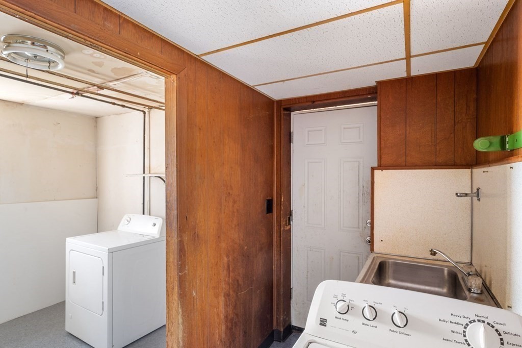 16 Blueview Road Boston, MA 02132 - Photo 26 of 33 a utility room with dryer and washer