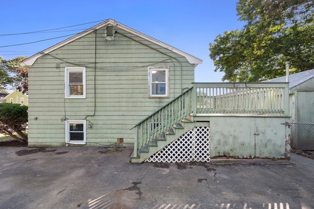 16 Blueview Road Boston, MA 02132 - Photo 29 of 33 a front view of a house with wooden fence